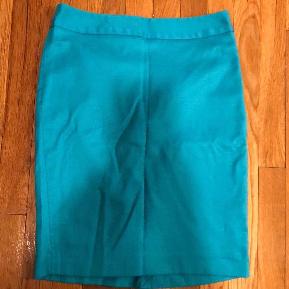 midi office skirt by The Limited in size 4